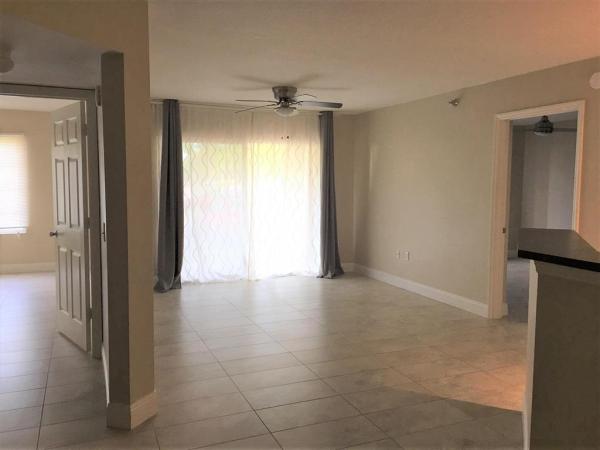 Emerald Isle At Laguna Lakes, 4171 San Marino Blvd #107, West Palm Beach, Florida 33409, image 1