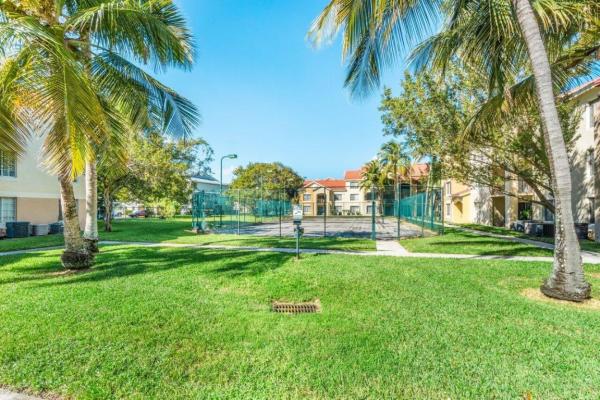 Emerald Isle At Laguna Lakes, 4021 San Marino Blvd #207, West Palm Beach, Florida 33409, image 1
