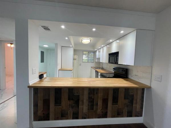 Ashton At Spring Lakes, 3186 Via Poinciana #105, Lake Worth Beach, Florida 33467, image 1