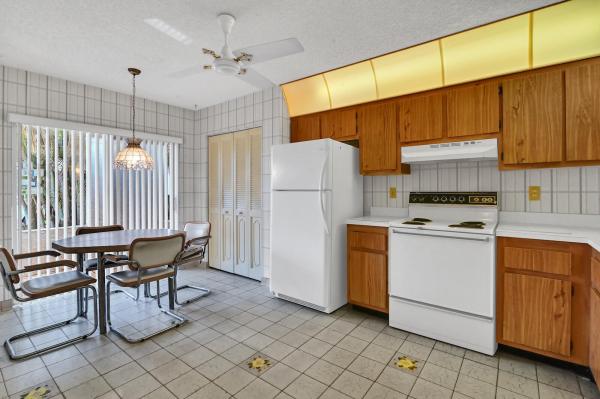 Poinciana Place Townhomes, 6995 Peony Pl, Lake Worth, Florida 33467, image 1