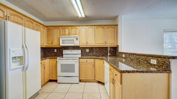 Hampshire Homes, 9012 NW 38th Dr #1, Coral Springs, Florida 33065, image 1