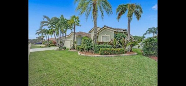 Regency Lake Estates, 9265 Olmstead Dr, Lake Worth Beach, Florida 33467, image 1