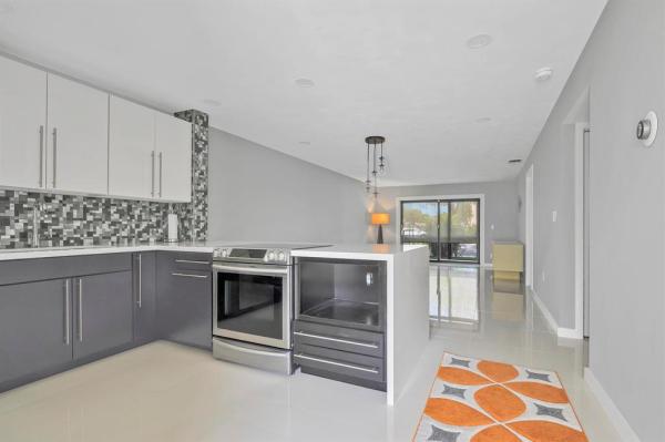 Villas At Carriage Hills Lakeside, 200 Berkley Rd #106, Hollywood, Florida 33024, image 1
