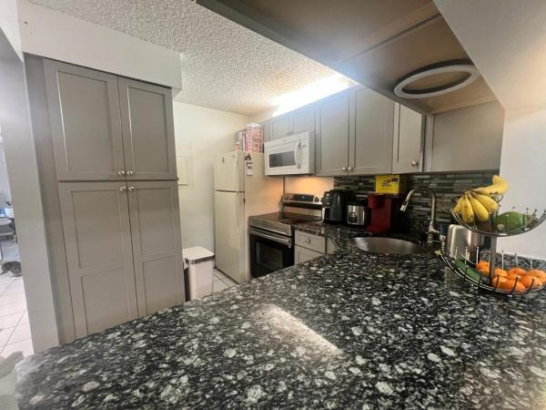 Pine Ridge North 2, 632 Sea Pine Way #A1, Greenacres, Florida 33415, image 1