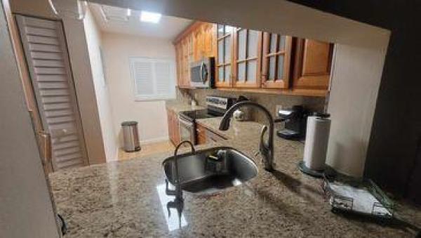 Poinciana Place Of Pine Island Ridge, 9430 Poinciana Pl #104, Davie, Florida 33324, image 1