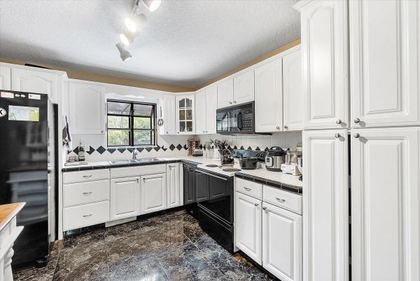 Town Oaks, 1001 Raintree Ln, Palm Beach Gardens, Florida 33410, image 3