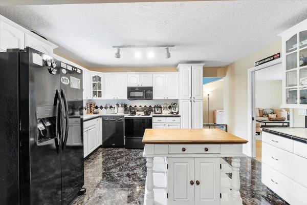 Town Oaks, 1001 Raintree Ln, Palm Beach Gardens, Florida 33410, image 2