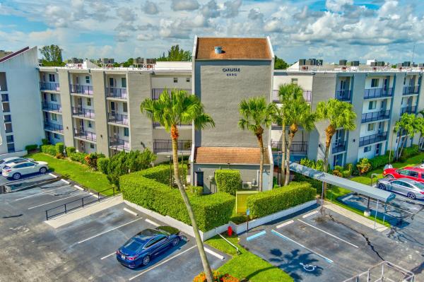 Carlisle At Poinciana Place, 6850 10th Ave #202, Lake Worth Beach, Florida 33467, image 1