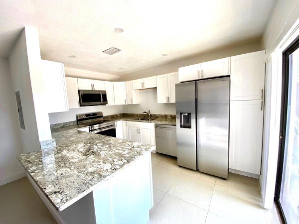 Woodstock Townhomes, 1909 N Congress Ave, West Palm Beach, Florida 33401, image 1