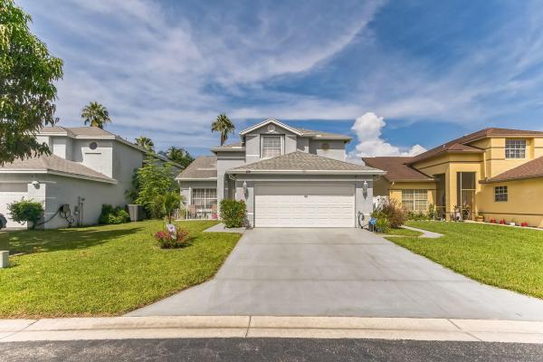 Whispering Pines, 128 Heatherwood Dr, Royal Palm Beach, Florida 33411, image 1