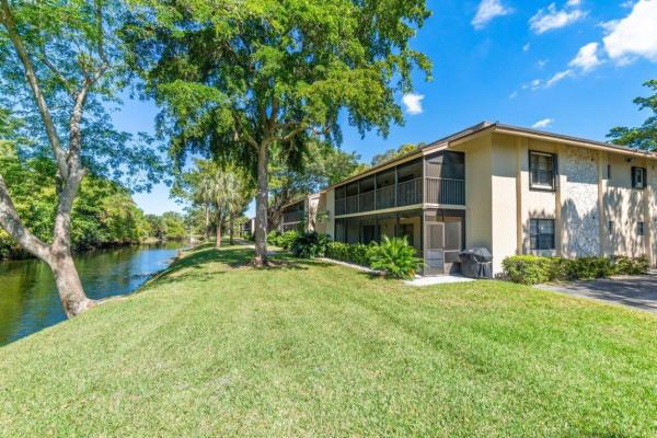 Hidden Woods Of Deer Creek, 147 Deer Creek Blvd #407, Deerfield Beach, Florida 33442, image 1
