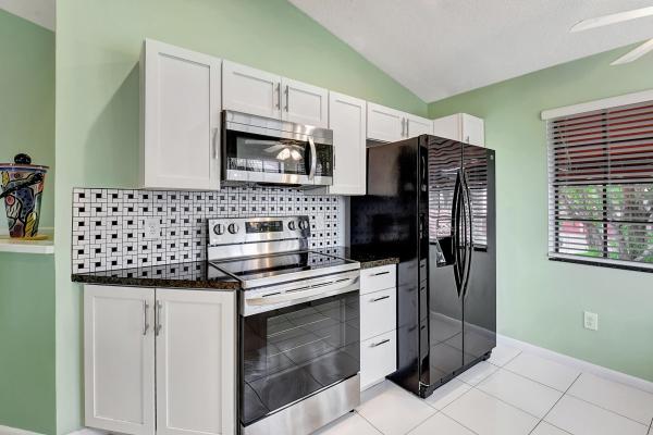 The Lexington Club Villas, 7832 Lexington Club Blvd #C, Delray Beach, Florida 33446, image 1