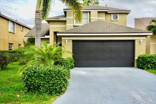 Whispering Pines, 133 Heatherwood Dr, Royal Palm Beach, Florida 33411, image 1