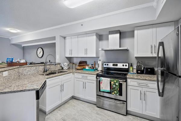 Emerald Isle At Laguna Lakes, 4240 San Marino Blvd #102, West Palm Beach, Florida 33409, image 1