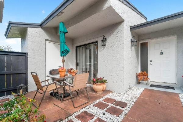 Indian Trail Villas, 103 Conaskonk Cir, Royal Palm Beach, Florida 33411, image 1