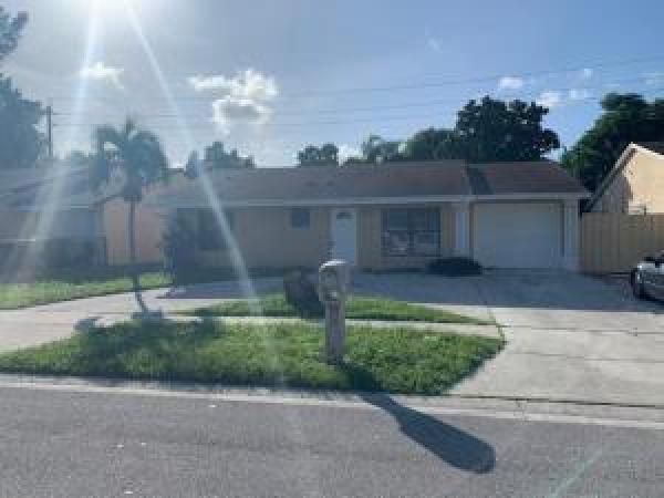 Lantana Homes, 5908 Triphammer Rd, Lake Worth Beach, Florida 33463, image 1