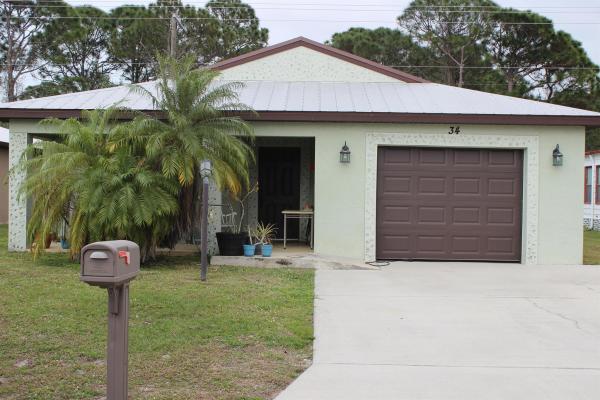 Spanish Lakes Country Club Village, 34 Calle De Lagos, Fort Pierce, Florida 34951, image 1