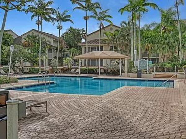 The Sterling Villages Of Palm Beach Lakes, 19117 Glenmoor Dr, West Palm Beach, Florida 33409, image 1