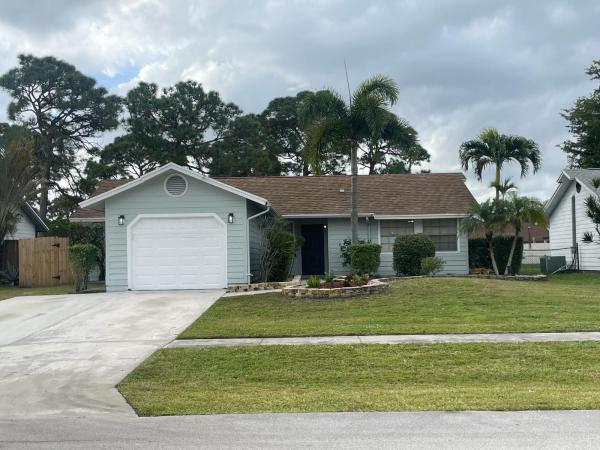 The Forest Homes, 5040 El Claro Cir, West Palm Beach, Florida 33415, image 1