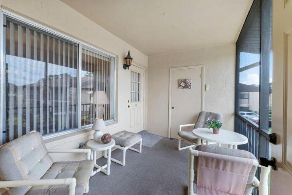 Pine Ridge South 2, 241 Pine Hov Cir #D-2, Greenacres, Florida 33463, image 1