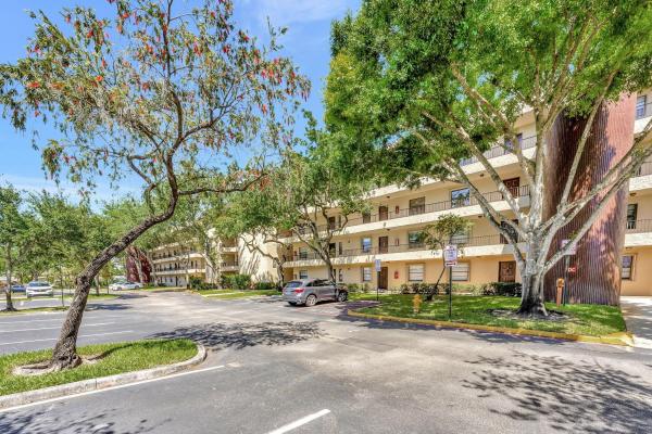 Plantation Racquet Club At Jacaranda, 10551 W Broward Blvd #404, Plantation, Florida 33324, image 1