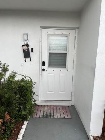 Greenway Village North, 143 West Ct, Royal Palm Beach, Florida 33411, image 1