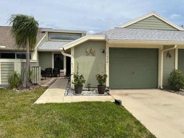 Villas Of Village Green, 1544 SE Crayrich Ct, Port St. Lucie, Florida 34952, image 1