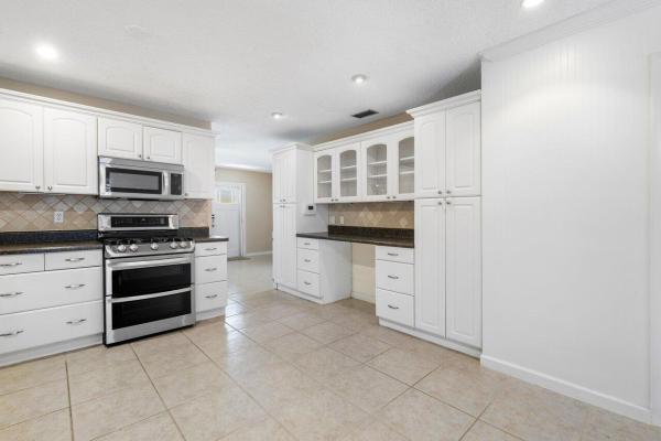 Concept Homes Of Lantana, 4945 Arena Way, Lake Worth, Florida 33463, image 1