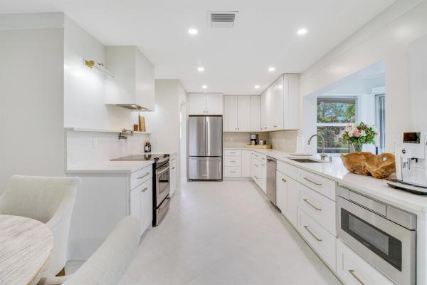 Cedar Key Villas, 125 Clubhouse Blvd, Atlantis, Florida 33462, image 1