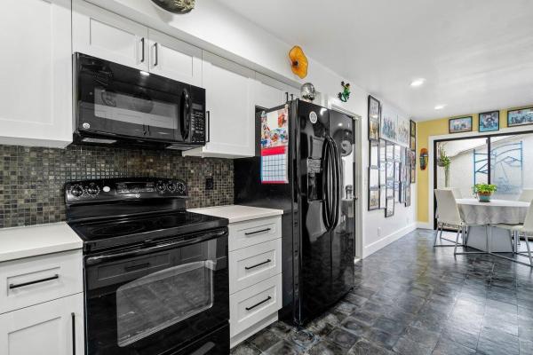 Townhomes Of Marlwood, 1 Edinburgh Dr, Palm Beach Gardens, Florida 33418, image 1