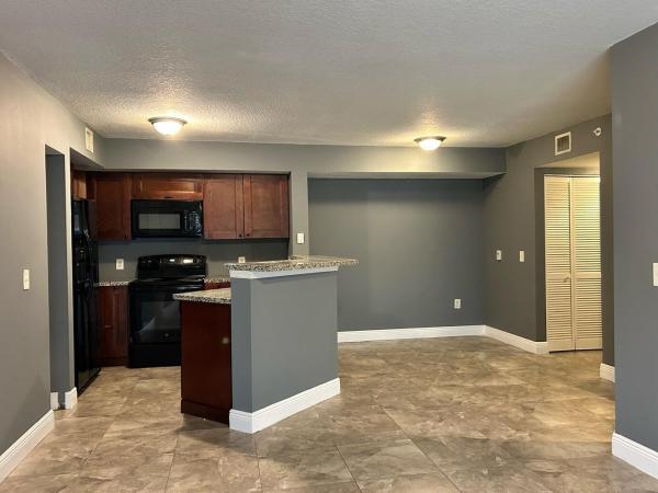Emerald Isle At Laguna Lakes, 4041 San Marino Blvd #105, West Palm Beach, Florida 33409, image 1