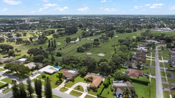 Palm Beach National Golf & Country Club Estates, 7404 Oakmont Dr, Lake Worth, Florida 33467, image 1