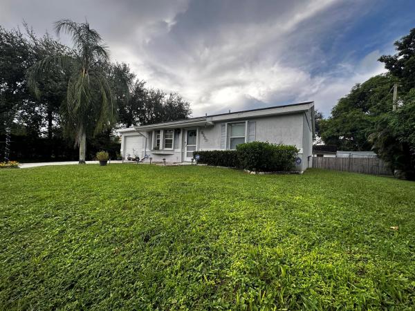 Tropical Country Estates, 9239 Bouquet Rd, Lake Worth Beach, Florida 33467, image 1