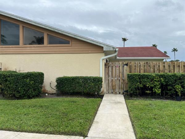 Westchester Townhouses, 4345 Woodstock Dr #A, West Palm Beach, Florida 33409, image 1