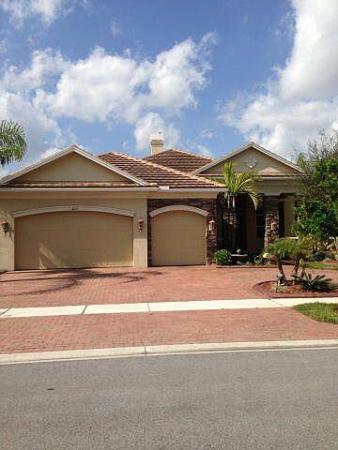 Greenwood Manor, 8205 Butler Greenwood Dr, Royal Palm Beach, Florida 33411, image 1