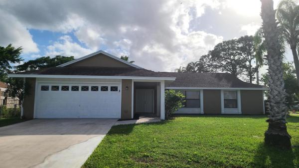 702 SE Starflower Ave, Port St. Lucie, Florida 34983, image 1