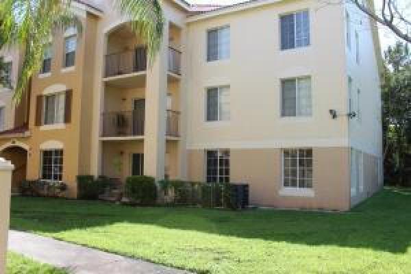 Emerald Isle At Laguna Lakes, 4211 San Marino Blvd #107, West Palm Beach, Florida 33409, image 1
