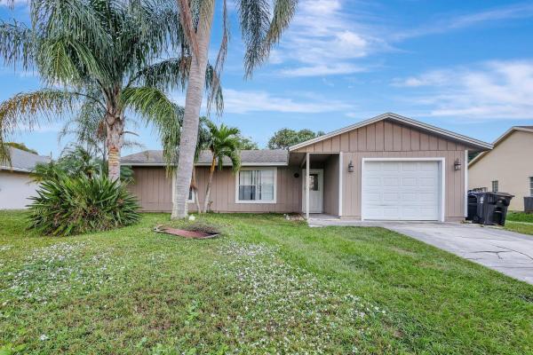1285 SW Avens St, Port St. Lucie, Florida 34983, image 1
