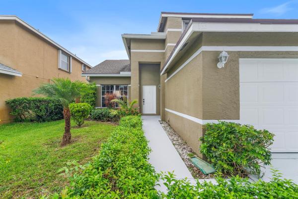 Whispering Pines, 133 Heatherwood Dr, Royal Palm Beach, Florida 33411, image 1