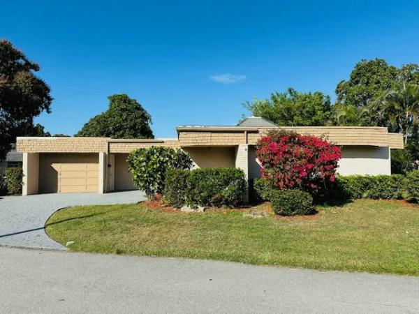 The Woodlands, 5703 S Bayberry Ln, Tamarac, Florida 33319, image 1