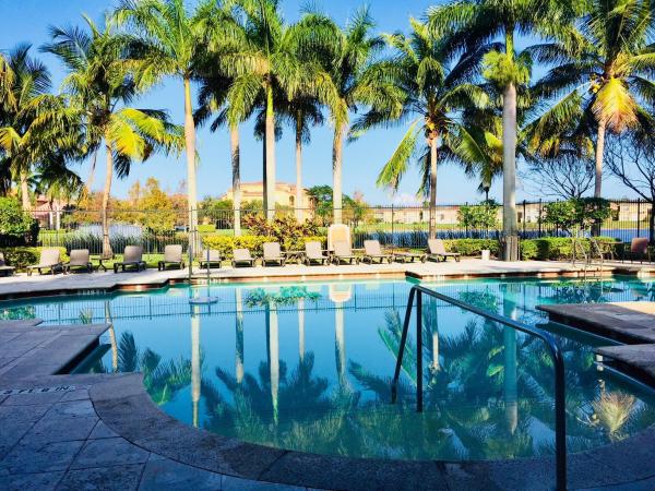 Emerald Isle At Laguna Lakes, 4190 San Marino Blvd #102, West Palm Beach, Florida 33409, image 1