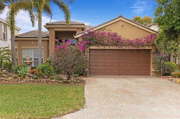 Thoroughbred Lake Estates, 10384 White Pinto Ct, Lake Worth Beach, Florida 33449, image 1