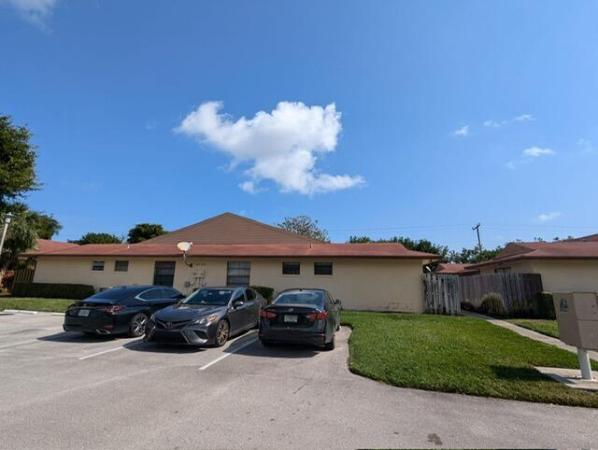 Westchester Townhouses, 4320 Woodstock Dr #D, West Palm Beach, Florida 33409, image 1