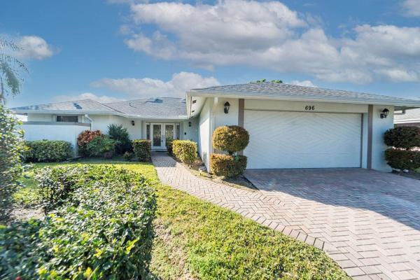 Sugar Pond Manor, 696 Juniper Pl, Wellington, Florida 33414, image 1