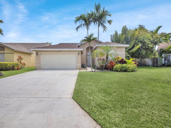 Whispering Pines, 150 Heatherwood Dr, Royal Palm Beach, Florida 33411, image 1