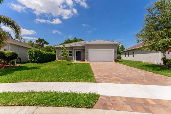 Moss Rose Place, 675 NE Moss Rose Pl, Port St. Lucie, Florida 34983, image 1