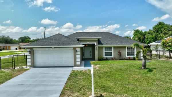 1897 SW Lofgren Ave, Port St. Lucie, Florida 34953, image 1