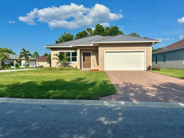 Moss Rose Place, 660 NE Moss Rose Pl, Port St. Lucie, Florida 34983, image 1