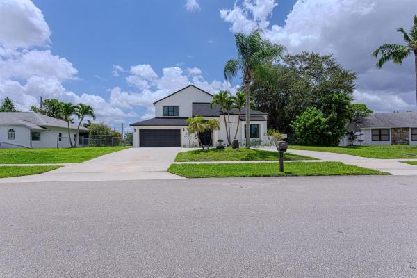 La Mancha, 102 Granada St, Royal Palm Beach, Florida 33411, image 1
