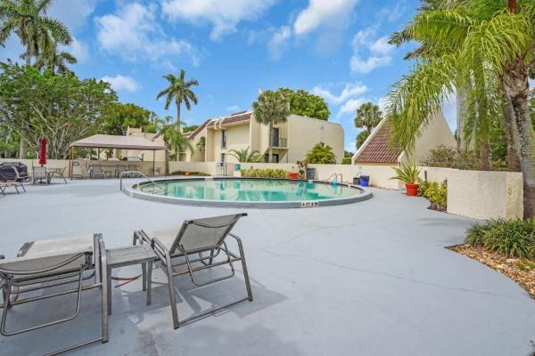 Garden Court Villas, 1701 Presidential Way #A201, West Palm Beach, Florida 33401, image 1